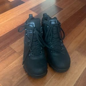 Black Timberland boots.